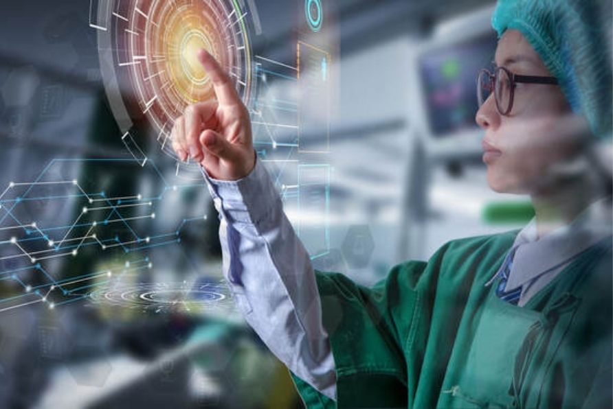 Physician pointing at digital board